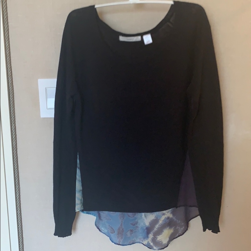 Sweater with a sheer detailed back